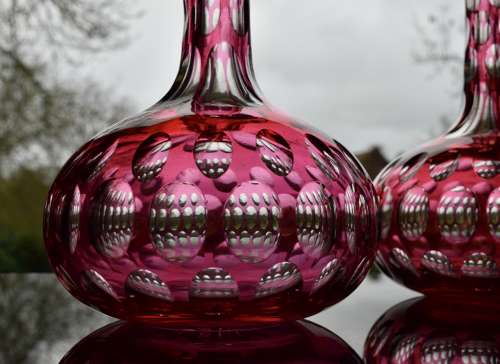 A Pair of Ruby Globe and Shaft Decanters c1880