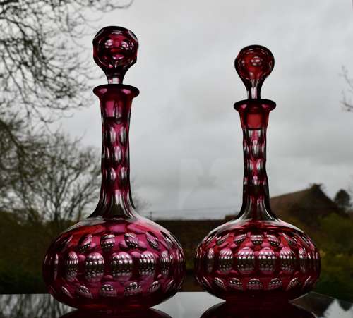 A Pair of Ruby Globe and Shaft Decanters c1880